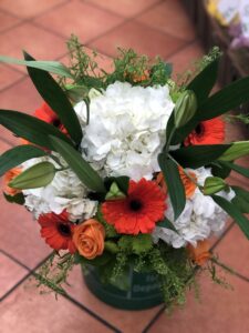 Orange Gerbera,white hydrangeas,white lilies,orange roses,greenery 